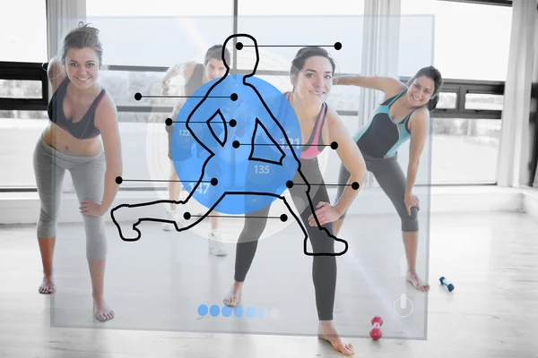 Femmes faisant de l'exercice avec une démonstration d'interface bleue futuriste — Photo