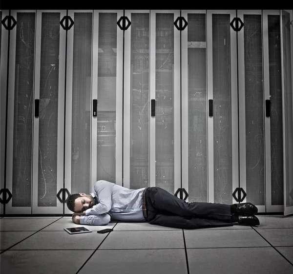 Data worker asleep on floor — Stock Photo, Image