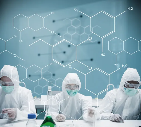 Chemists working in protective suit with futuristic interface sh — Stock Photo, Image