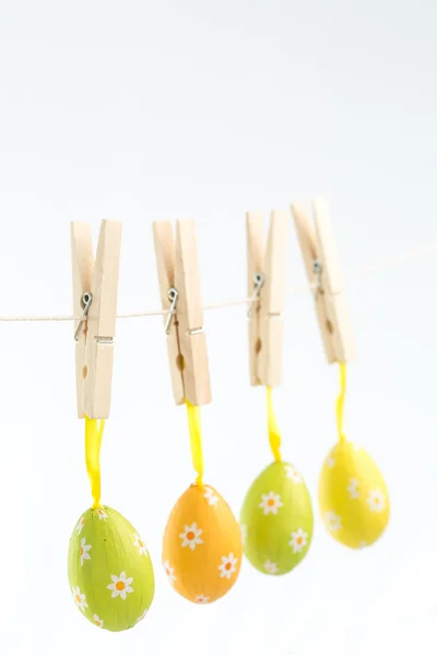 Easter eggs hanging from a line — Stock Photo, Image