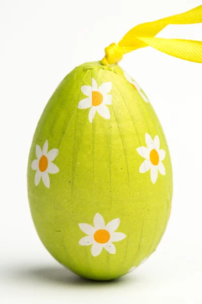 Green wrapped Easter egg — Stock Photo, Image