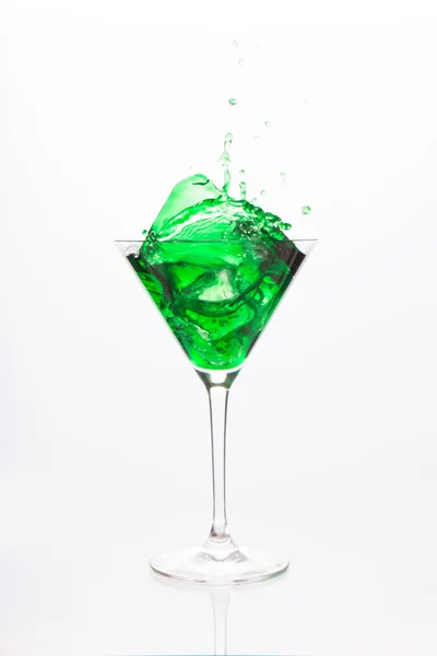 Cocktail glass with green alcohol — Stock Photo, Image