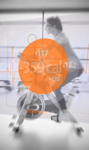 Rower treningowy jazda konna kobieta z futurystyczny interfejs — Zdjęcie stockowe