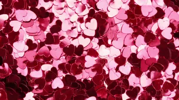 Confiti rosa en forma de corazón — Vídeo de stock