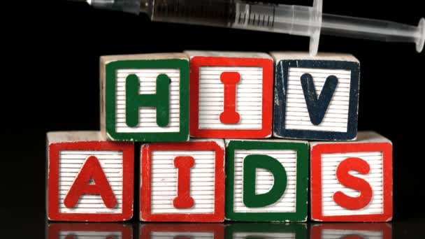 Σύριγγα που υπάγονται στο μπλοκ ορθογραφία aids και hiv — Αρχείο Βίντεο