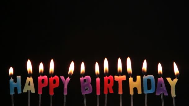 Happy birthday candles being blown out — Stock Video