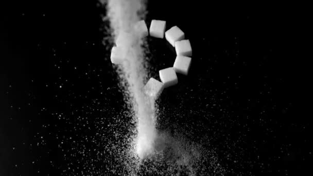 Sugar powder being poured over dice put in question mark — Stock Video