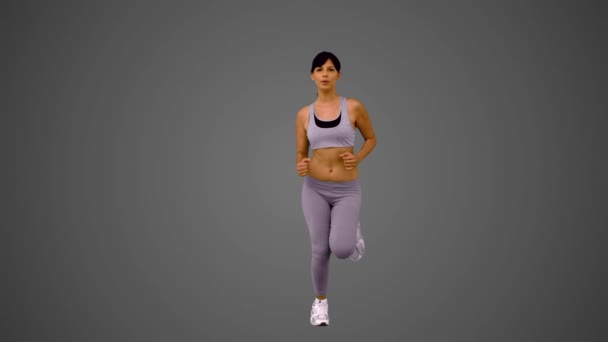 Attractive brunette jogging — Stock Video