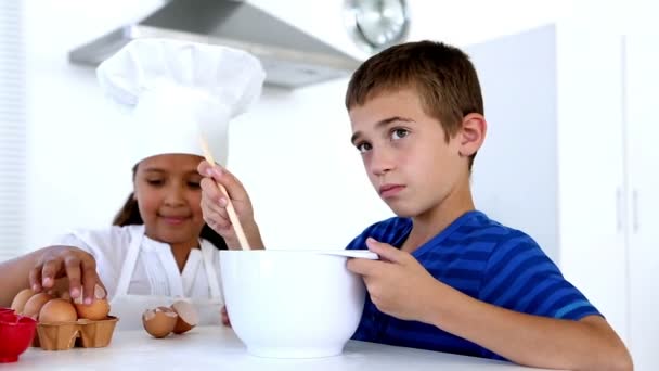 Siblings preparing pastry together — Stock Video