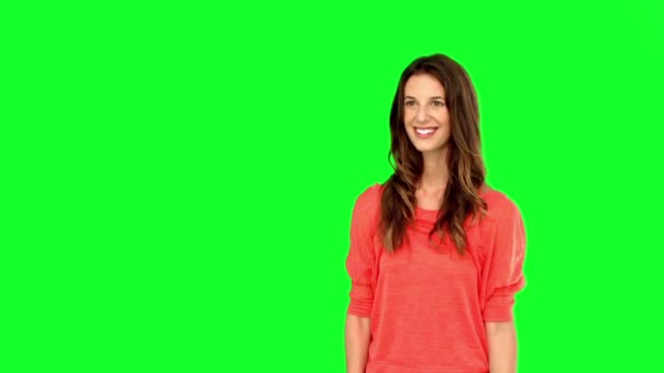 Woman catching a basketball on green screen — Stock Video