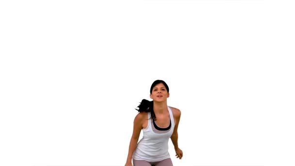 Mujer en forma saltando y posando — Vídeos de Stock