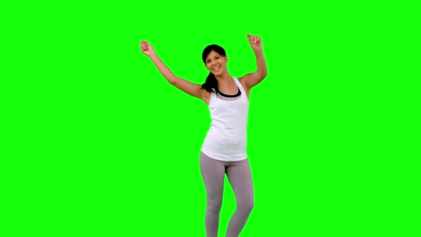 Woman in sportswear dancing on green screen — Stock Video