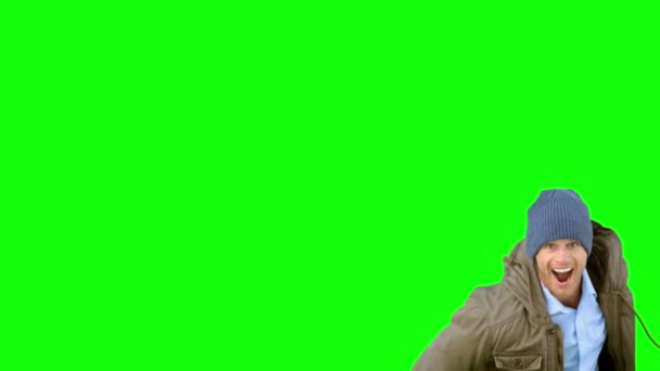 Man jumping and turning on green screen — Stock Video