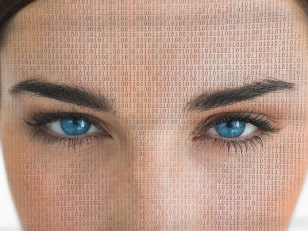 Attraktive blauäugige Frau mit binärer Codierung im Gesicht — Stockfoto