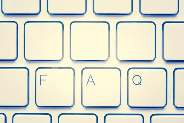 Teclado em branco com FAQ — Fotografia de Stock