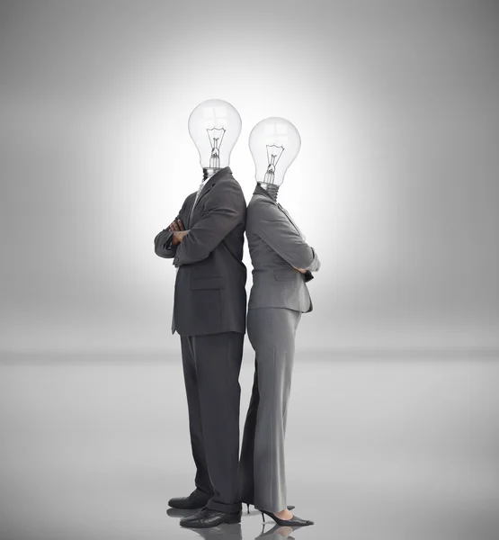 Negócio com lâmpadas em vez de cabeças — Fotografia de Stock