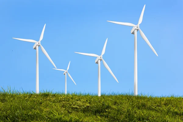 Four turbines on the grass — Stock Photo, Image