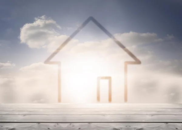 Dibujo de una casa sobre tablas de madera y nubes — Foto de Stock