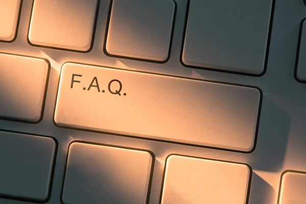 Clavier avec gros plan sur le bouton Foire aux questions — Photo