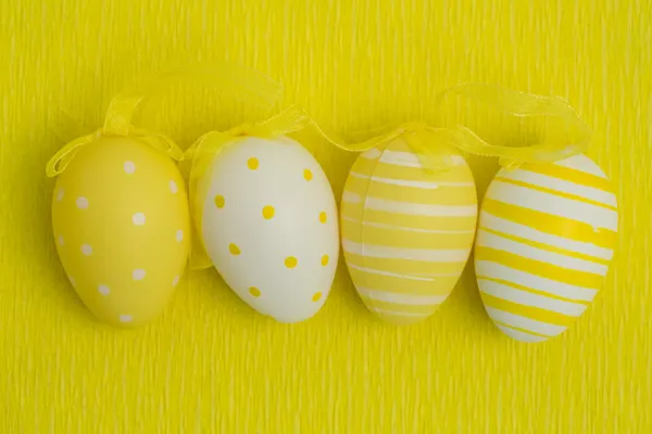 Four easter eggs in a row — Stock Photo, Image