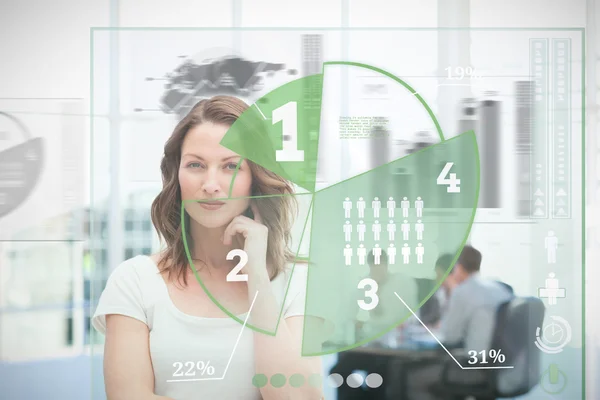 Blonde businesswoman using green pie chart interface — Stock Photo, Image