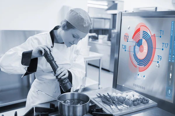 Chef cooking for a restaurant with futuristic interface — Stock Photo, Image