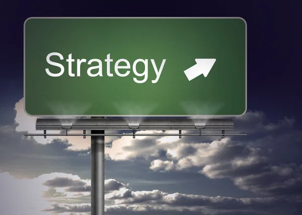 Green billboard showing the direction of the strategy — Stock Photo, Image