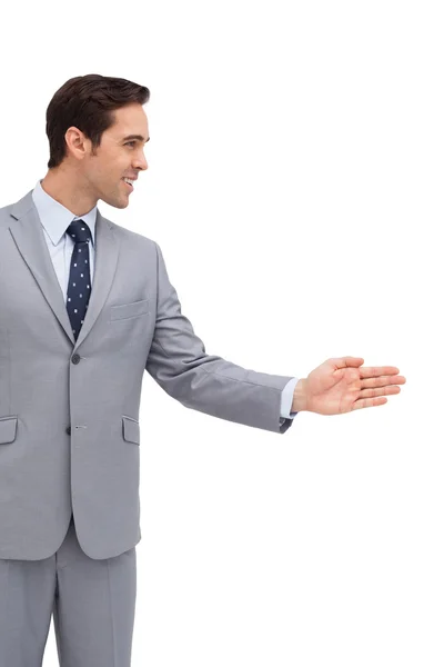 Joven hombre de negocios dando su mano —  Fotos de Stock