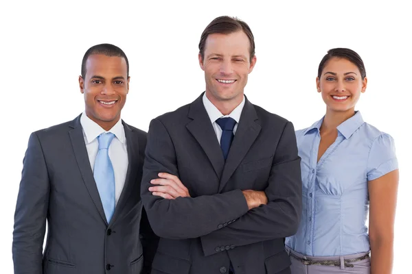 Grupo de negocios sonrientes de pie juntos — Foto de Stock