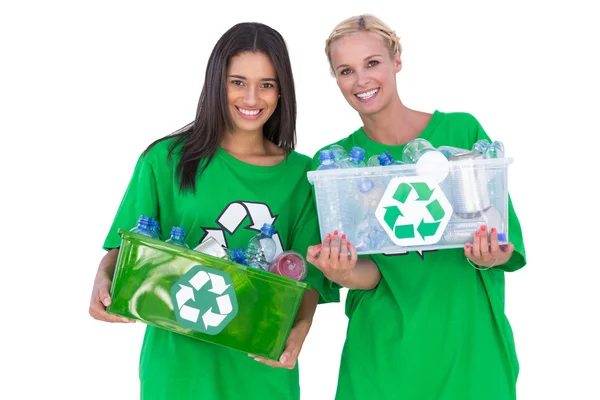 Enivromental activists holding box of recyclables — Stock Photo, Image