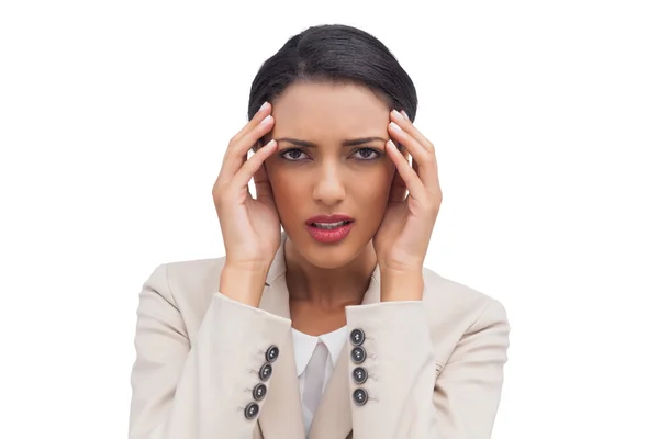 Unga attraktiva affärskvinna med huvudvärk — Stockfoto