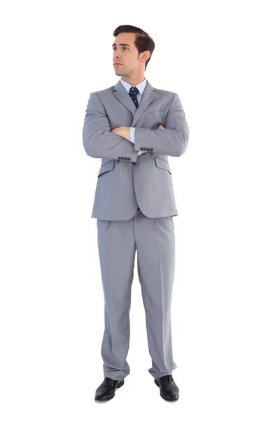 Serious businessman with arms crossed — Stock Photo, Image