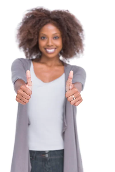 Cheerful woman giving thumbs up — Stock Photo, Image