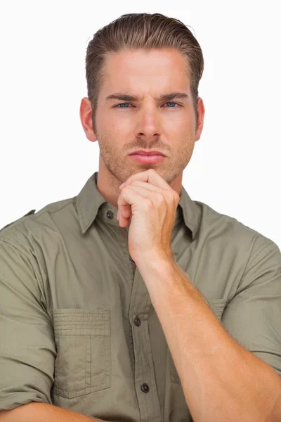 Thoughtful man looking at camera — Stock Photo, Image