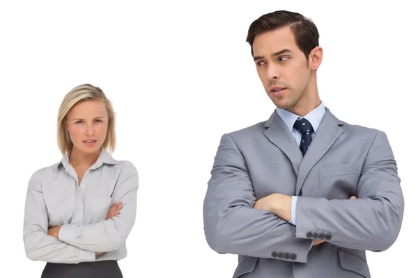 Business standing together showing rivalry — Stock Photo, Image