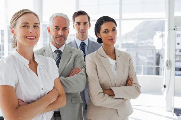 Smiling business standing together — Stock Photo, Image