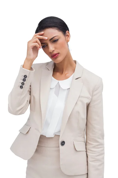 Worried businesswoman holding her head — Stock Photo, Image