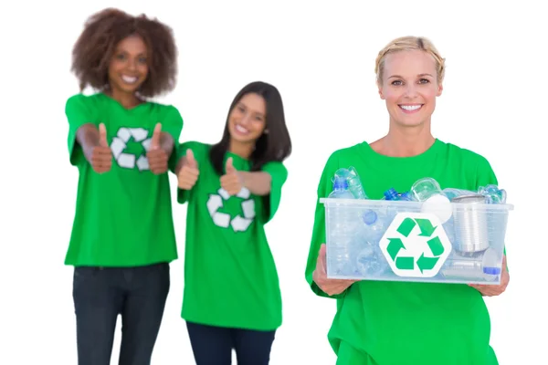 Smiling activist holding recycling box — Stock Photo, Image