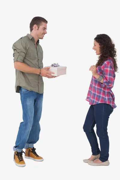 Man giving his friend a present — Stock Photo, Image