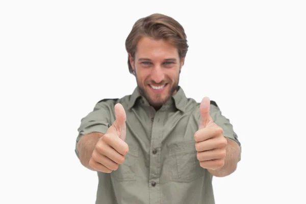 Gelukkig man geven thumbs up camera — Stockfoto