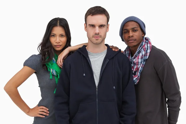 Fashionable young friends looking at camera — Stock Photo, Image