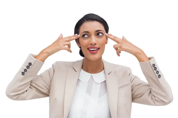 Vertrouwen jonge zakenvrouw haar hoofd met haar vingers wijzen — Stockfoto