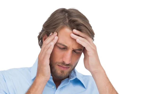 Tanned man having a headache — Stock Photo, Image