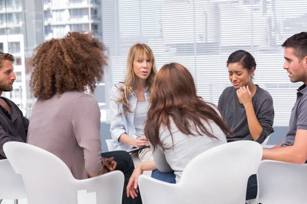 Woman crying during group therapy session — Stock Photo, Image
