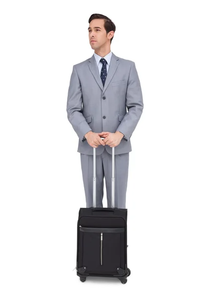 Homem de negócios sério esperando com sua bagagem — Fotografia de Stock