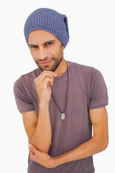 Thinking man wearing beanie hat — Stock Photo, Image