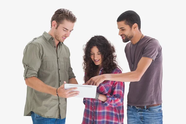 Stylish friends looking at tablet — Stock Photo, Image