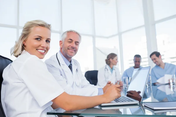 Two doctors smiling — Stock Photo, Image