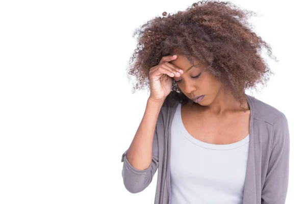 Mulher triste segurando sua testa com a mão — Fotografia de Stock