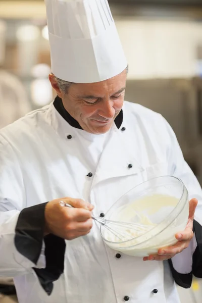 Chef whisking cream — Stock Photo, Image